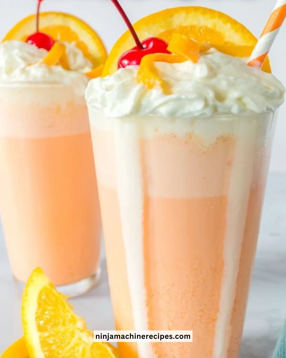 Delicious creamsicle milkshake topped with whipped cream and orange zest.
