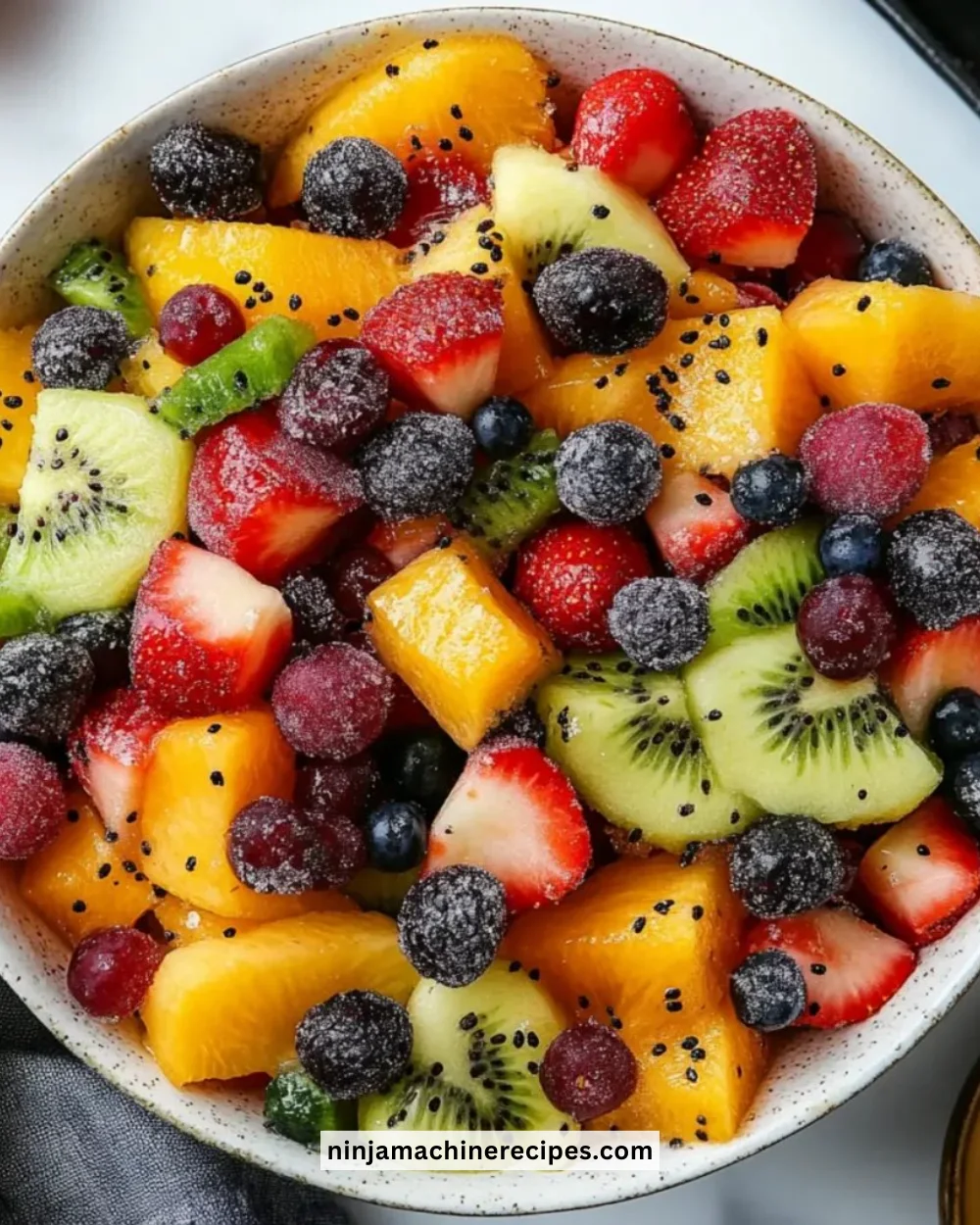 Festive winter fruit salad with vibrant seasonal fruits in a bowl