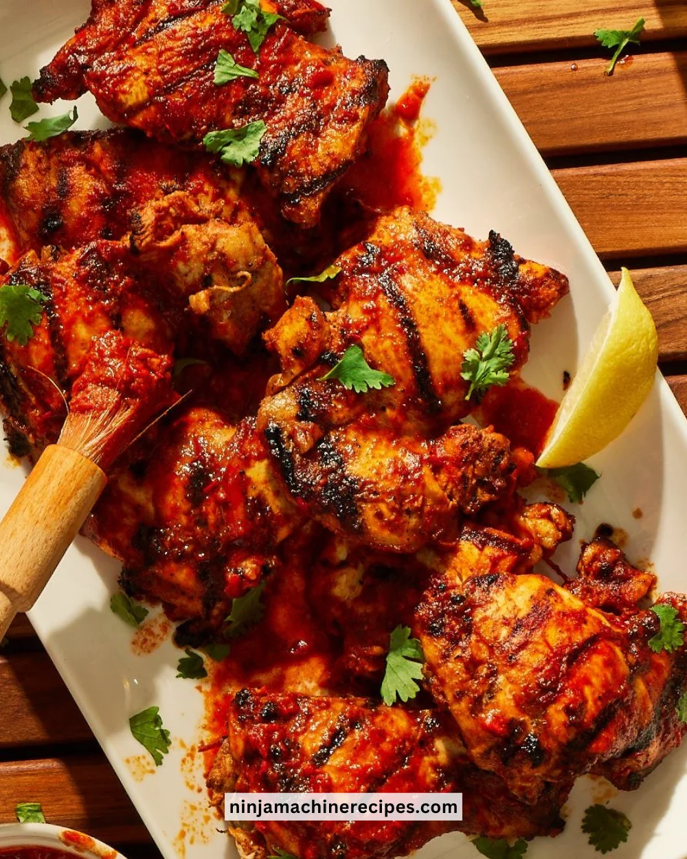 Delicious Harissa Grilled Chicken garnished with fresh herbs