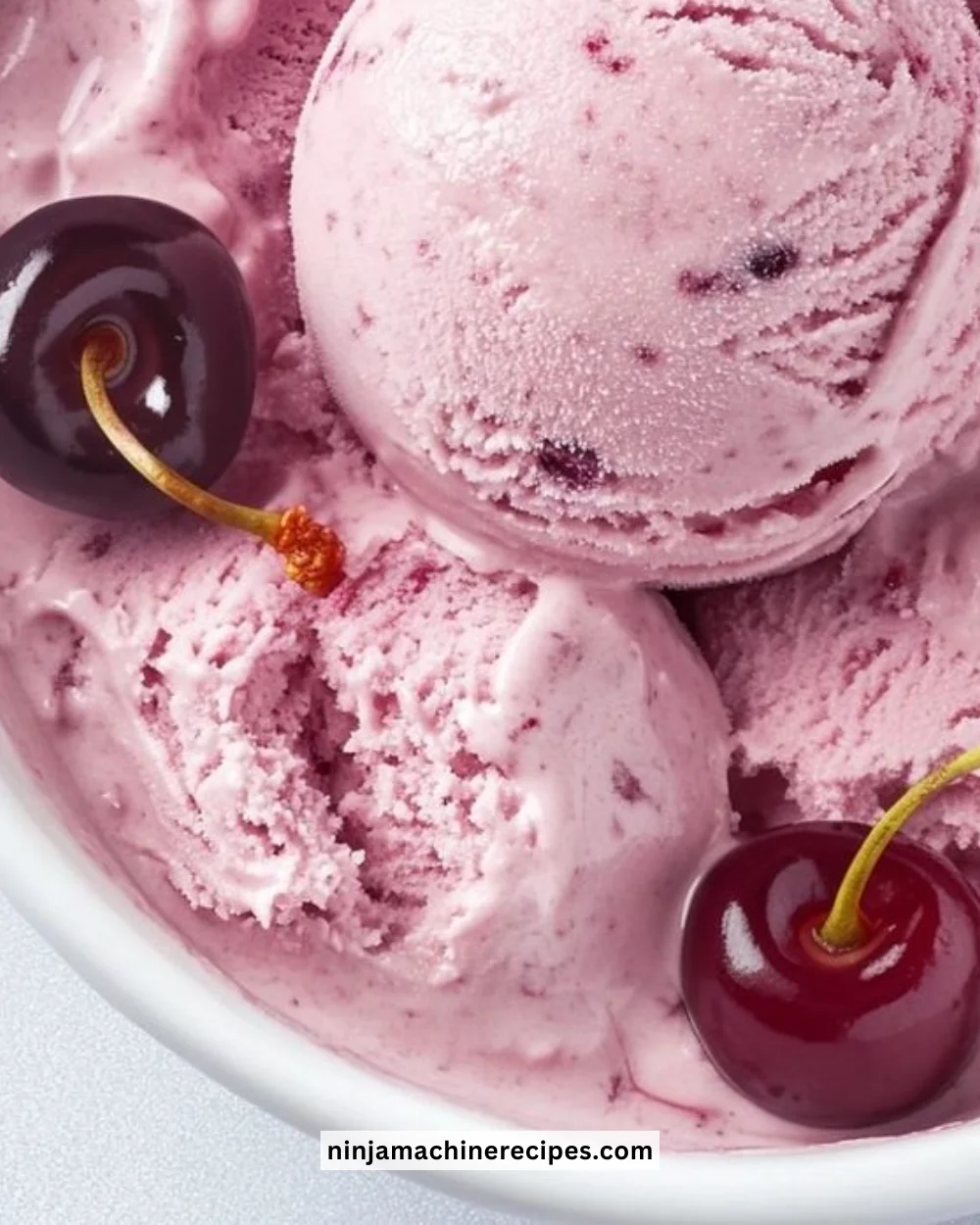Healthy Ninja Creami cherry ice cream in a bowl with cherries on top