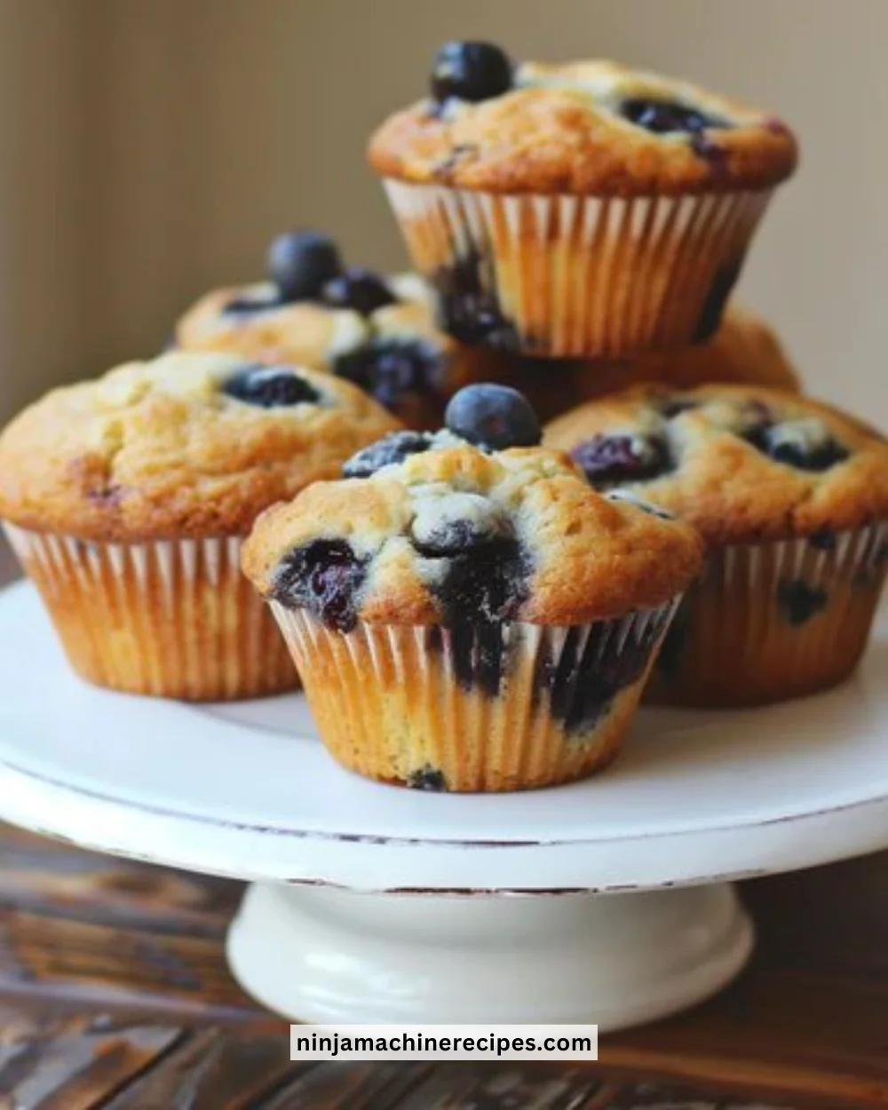 Keto Blueberry Muffins on a wooden table, perfect for low-carb diets.