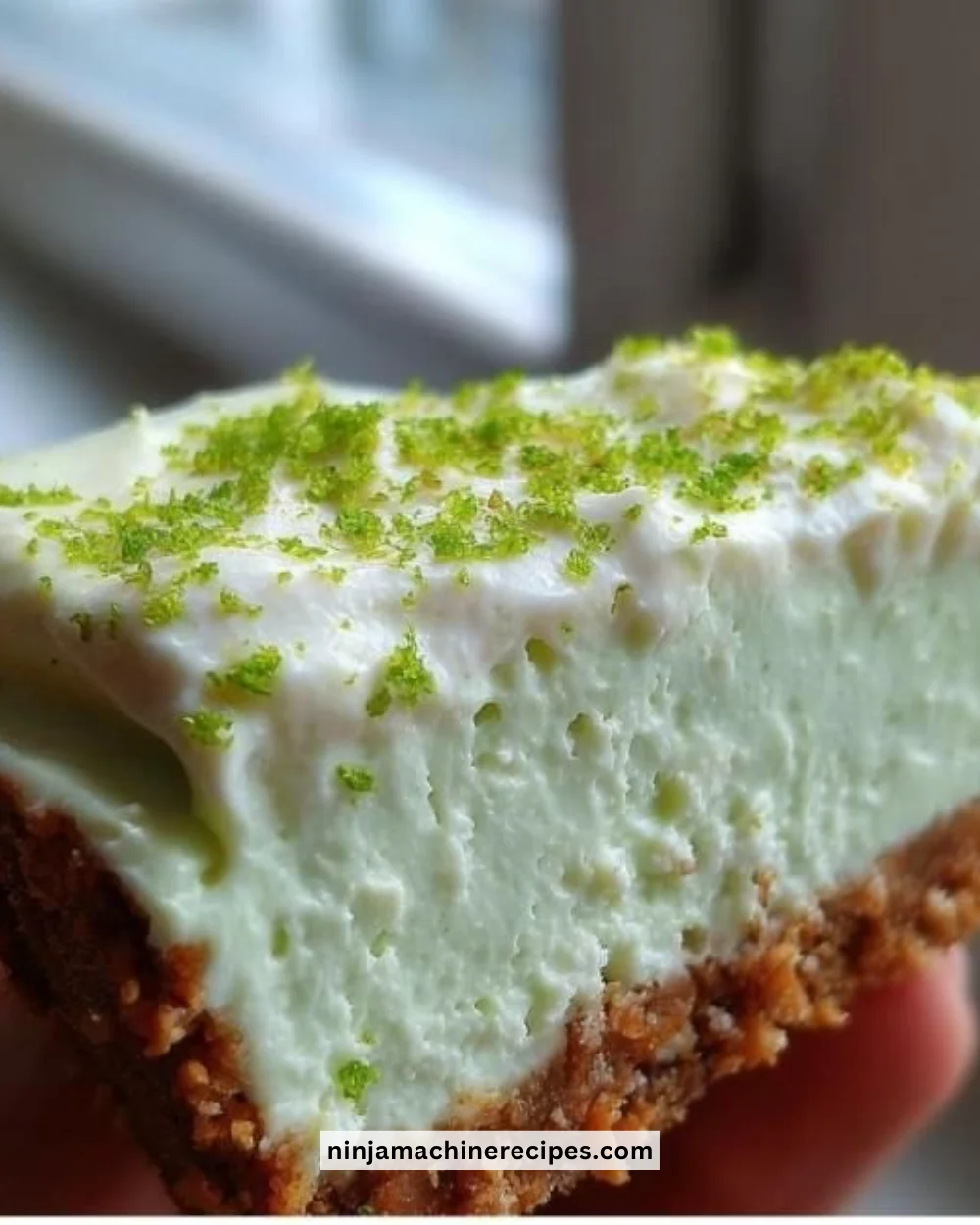 Delicious homemade Key Lime Cheesecake with a graham cracker crust and lime topping