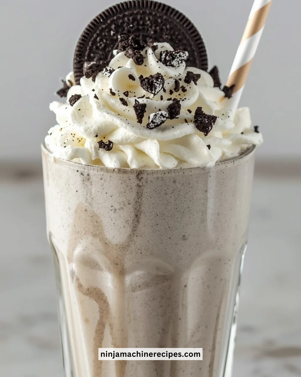 Ninja Slushie Oreo Milkshake topped with whipped cream and crushed Oreos