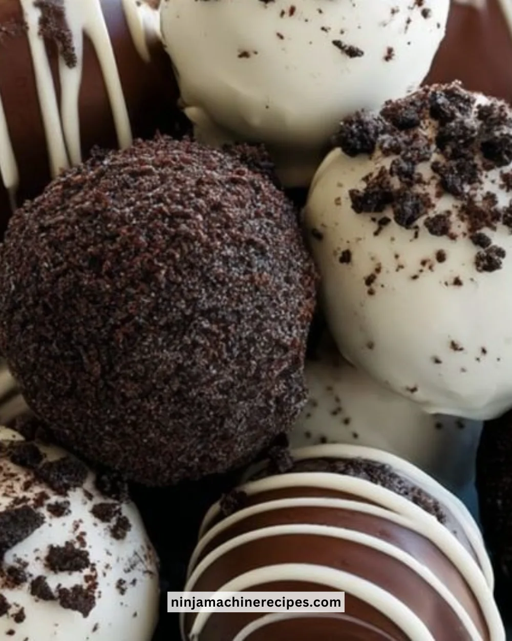 A plate of homemade Oreo Balls coated in chocolate and decorated with sprinkles