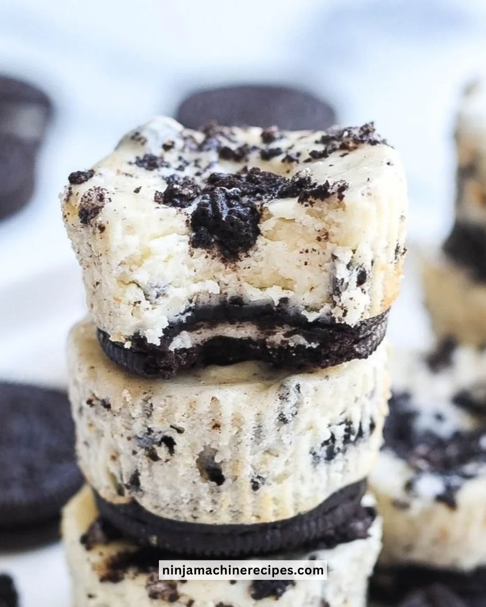 Delicious Oreo Cheesecake Bites on a plate, perfect for dessert lovers.