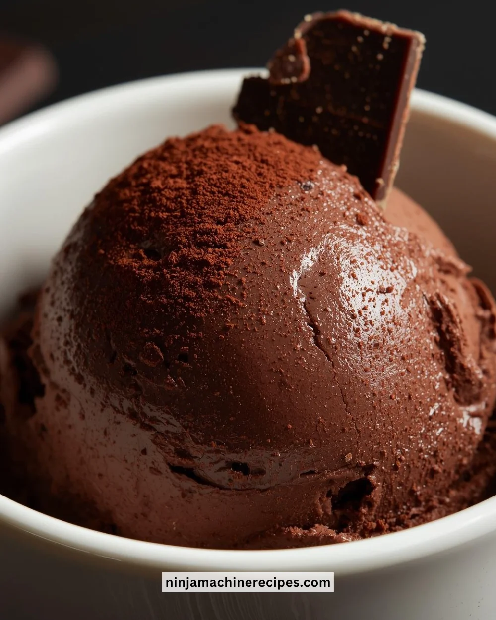 Healthy protein shake ice cream topped with fresh fruits in a bowl.