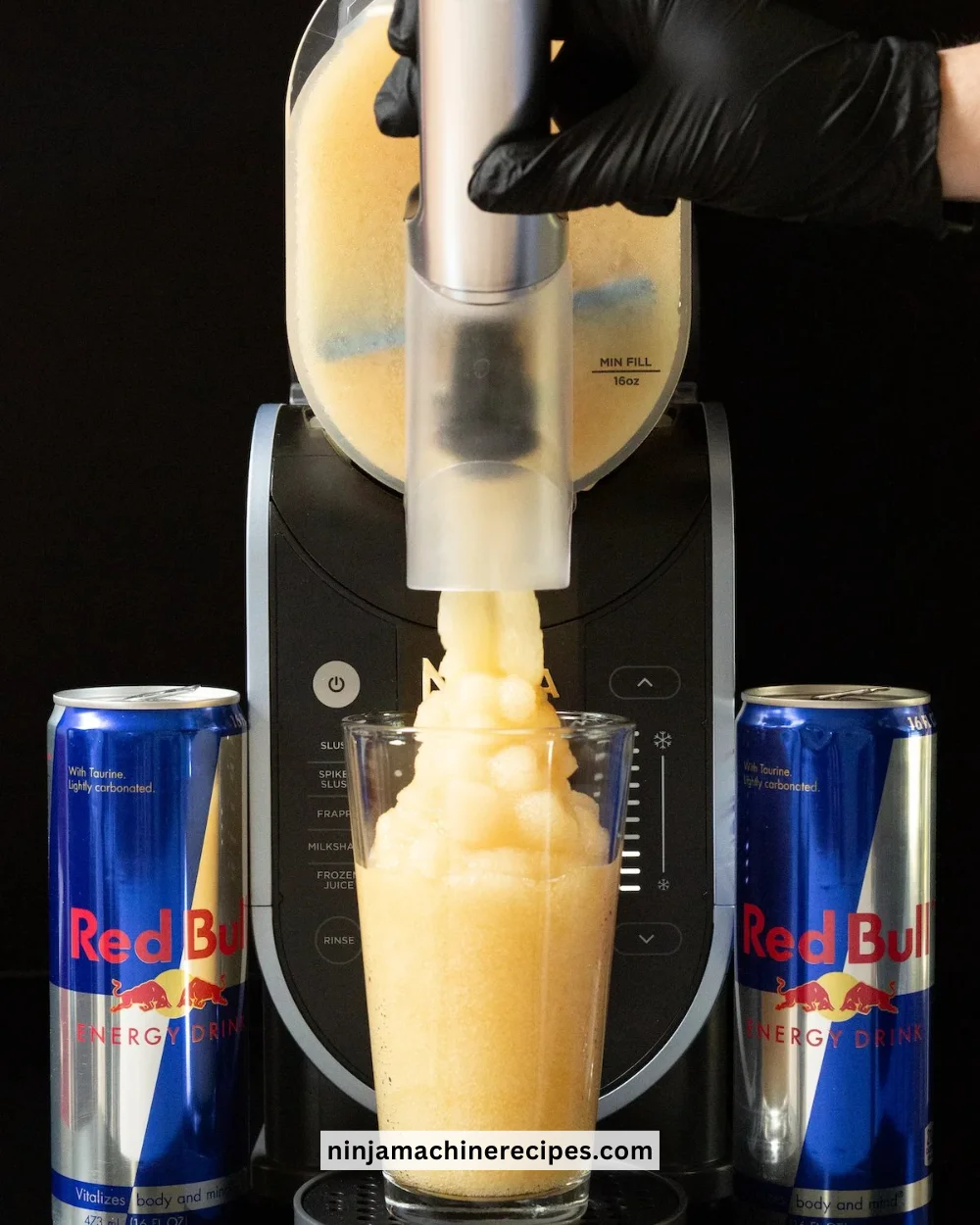 Vibrant Red Bull Ninja Slushie in a cup with ice and colorful straw