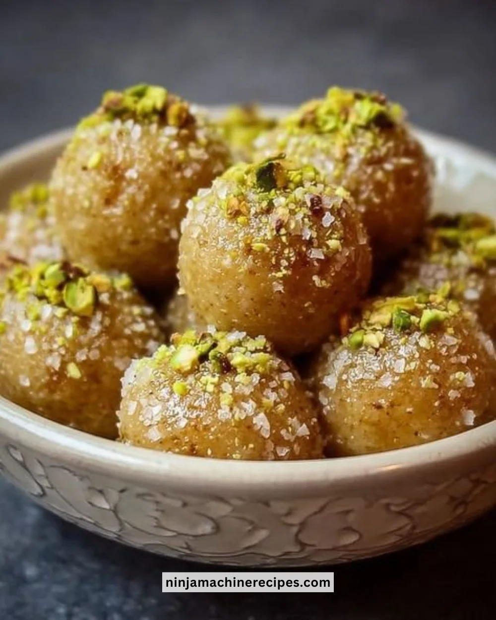 Delicious ricotta pistachio bites with honey on a serving platter