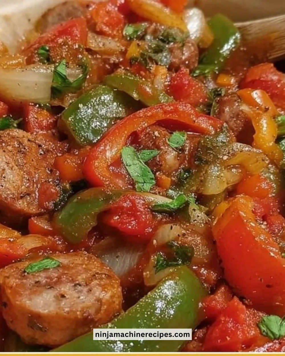 Slow cooker sausage and peppers dish served in a bowl
