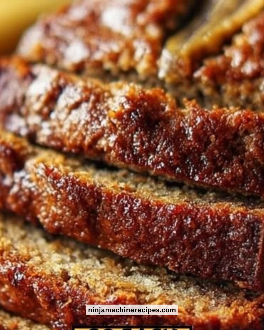 Deliciously moist banana bread loaf with ripe bananas and a golden crust.
