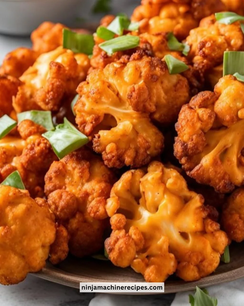 Air Fryer Buffalo Cauliflower with sauce, ready to serve