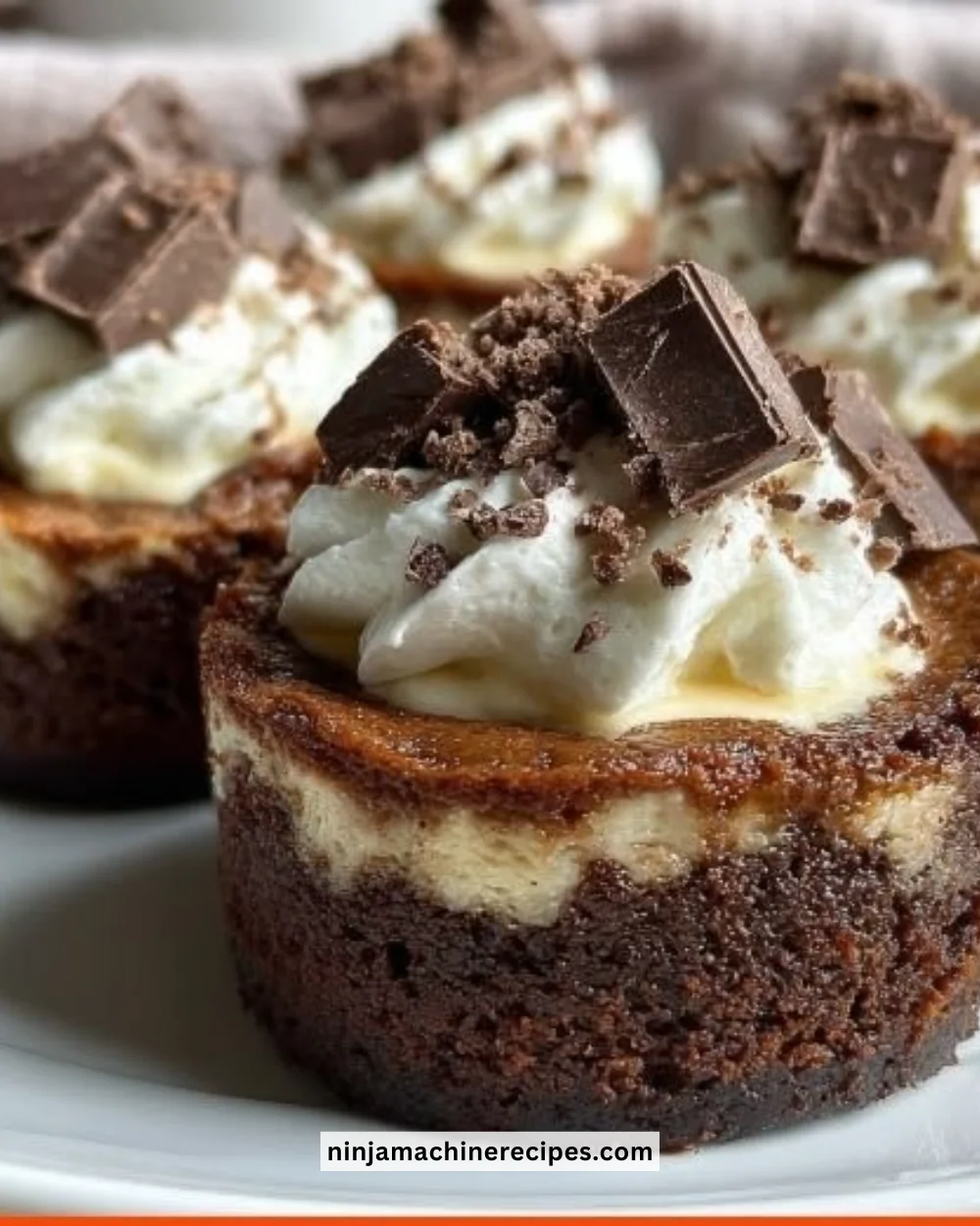 Delicious brownie bottom mini cheesecakes topped with creamy filling