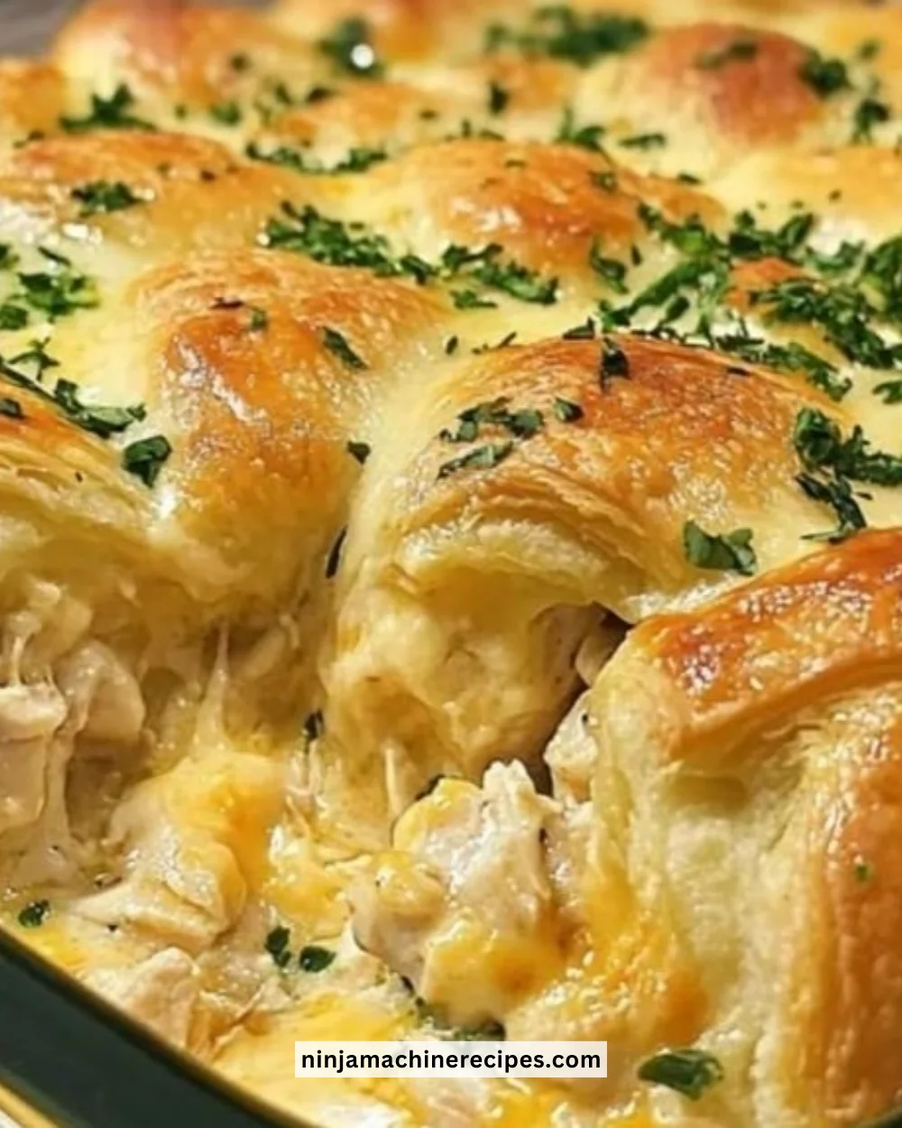 Cheesy chicken crescent bake in a casserole dish, fresh out of the oven.