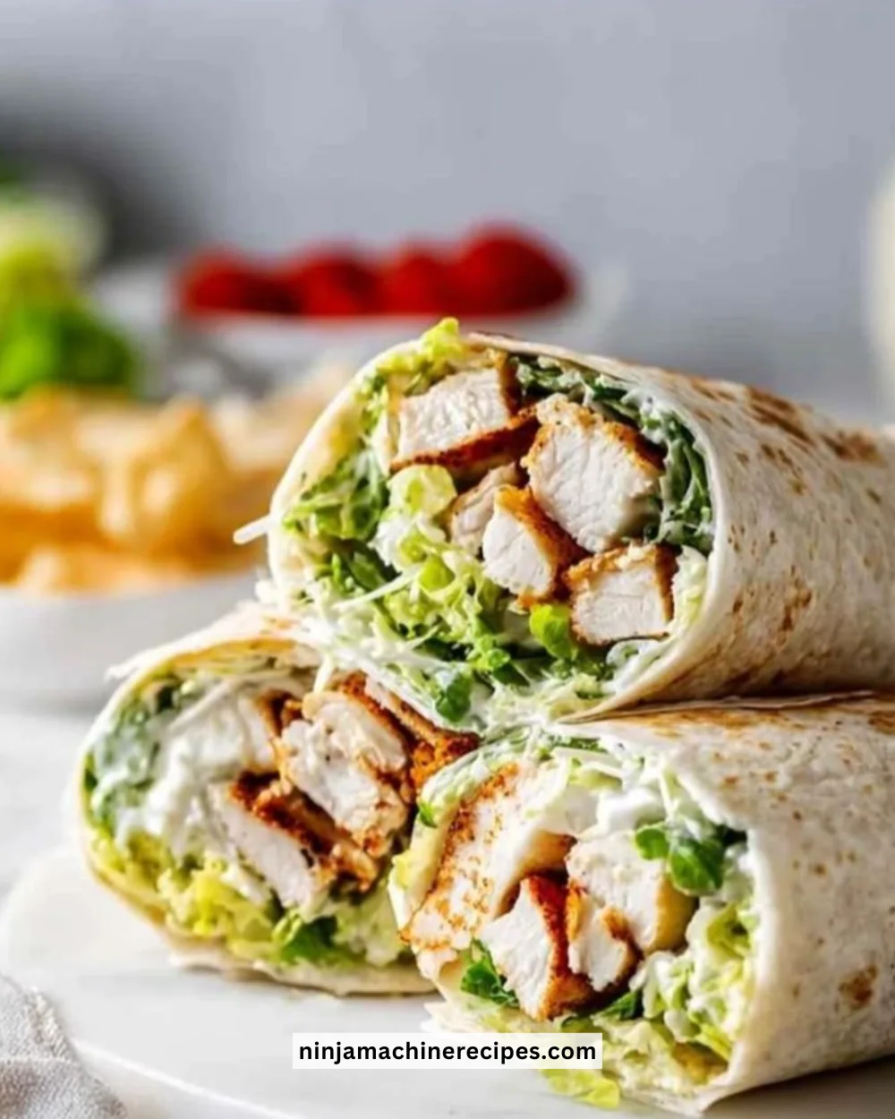 Delicious Chicken Caesar Wraps with chicken, lettuce, and Caesar dressing
