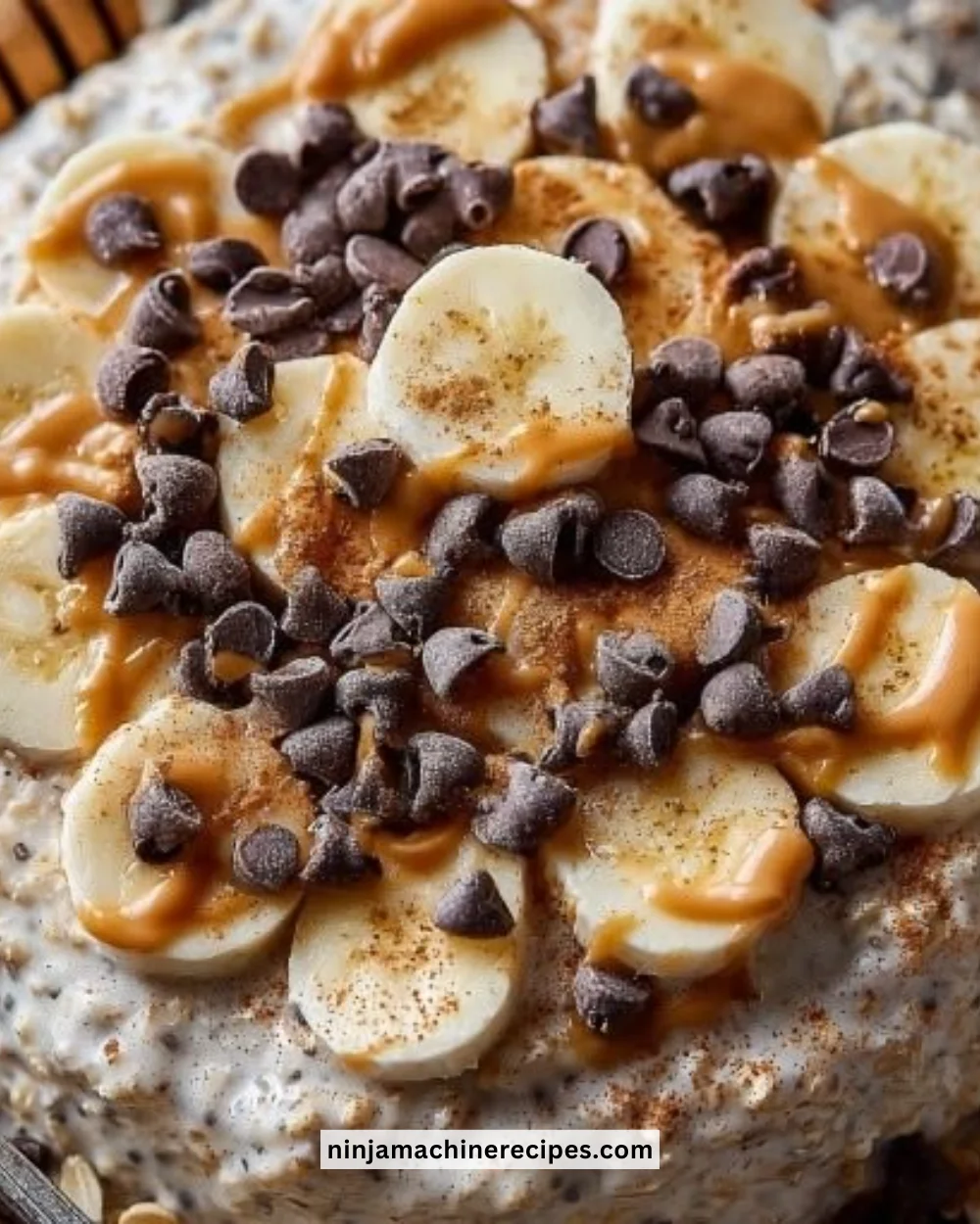 Delicious cookie dough overnight oats in a mason jar topped with chocolate chips.