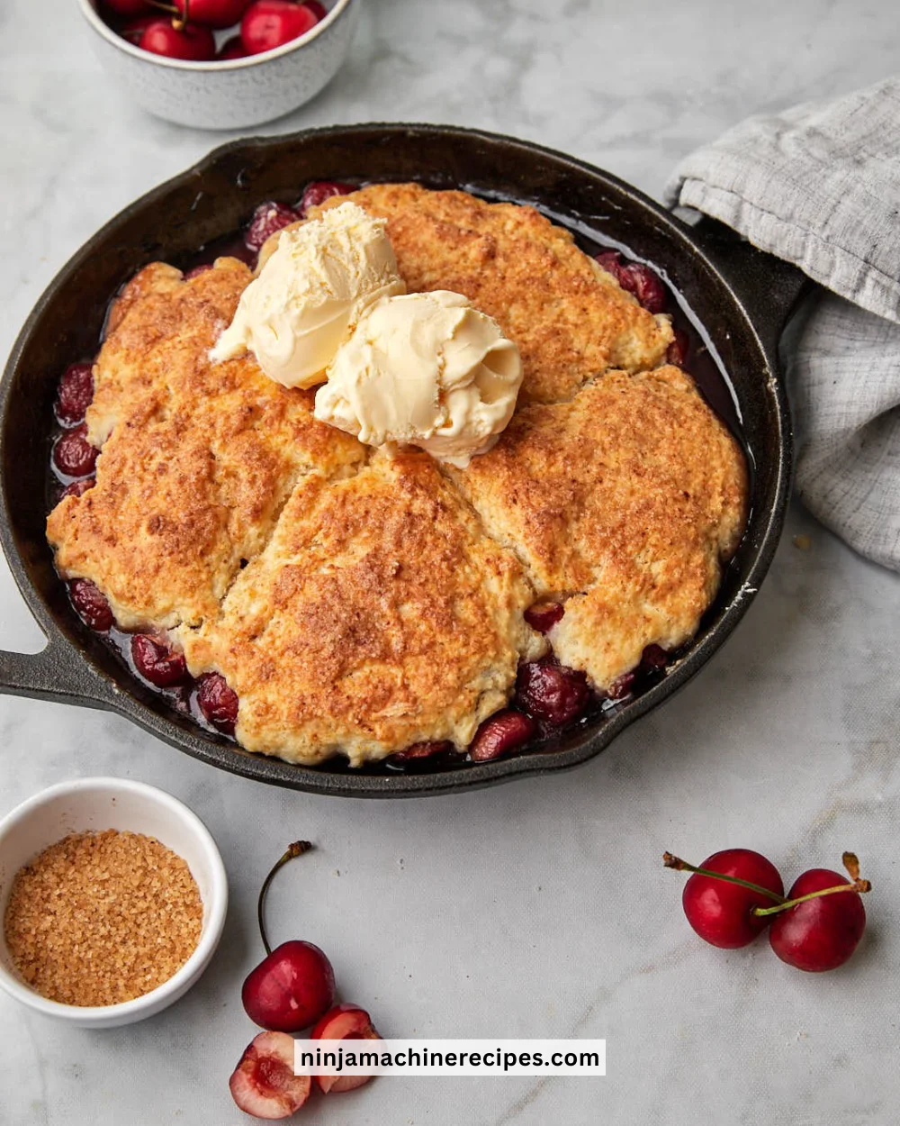 Delicious homemade cherry cobbler dessert in a baking dish