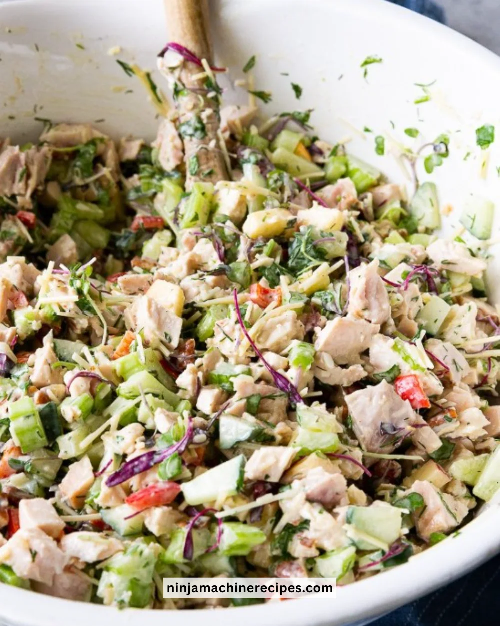 Bowl of easy wholesome chicken salad with fresh ingredients