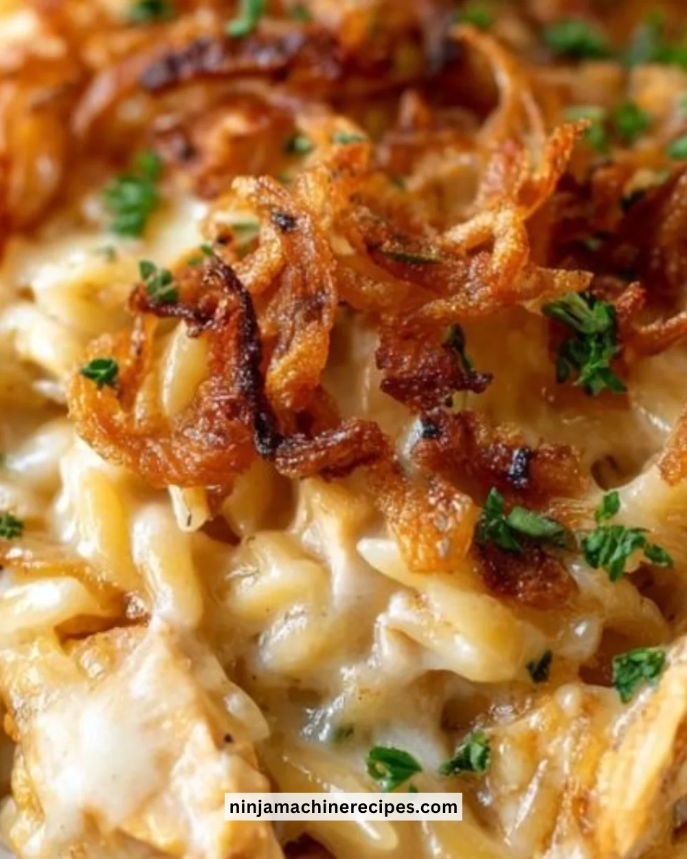 Delicious French onion chicken casserole with orzo and melted cheese