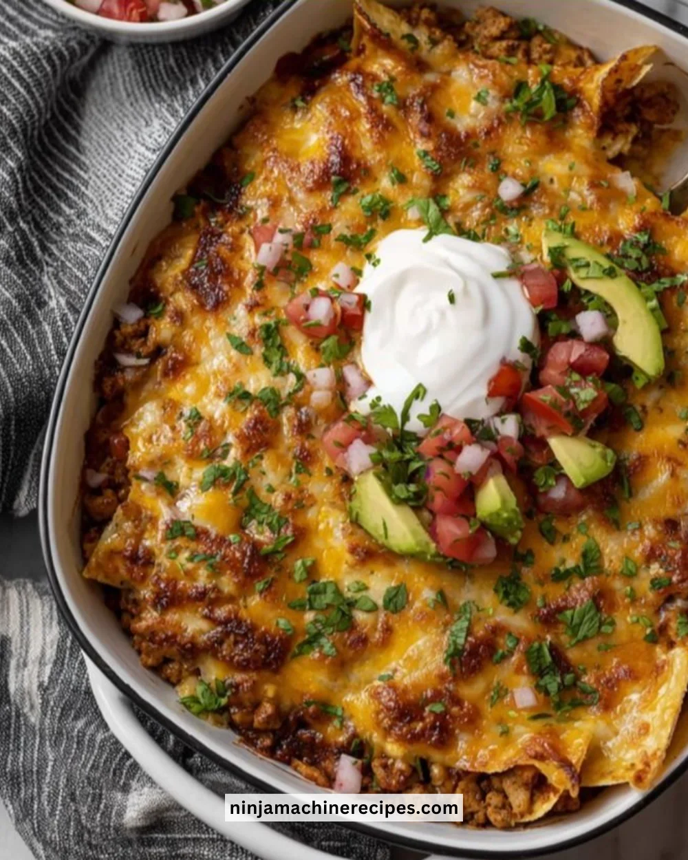 Ground Chicken Taco Casserole served in a dish with toppings.