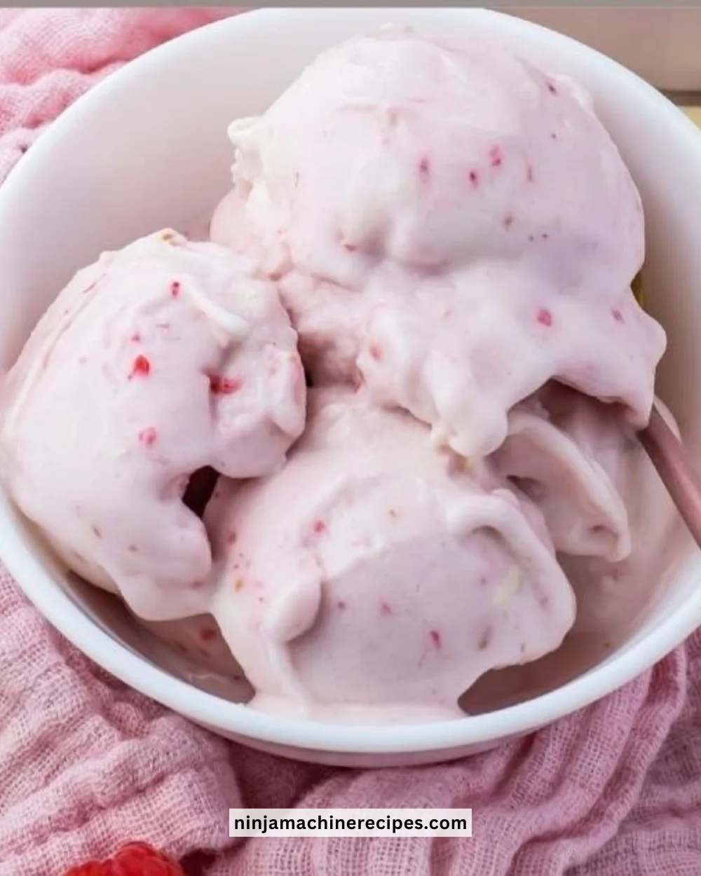 Healthy white chocolate raspberry protein ice cream in a bowl