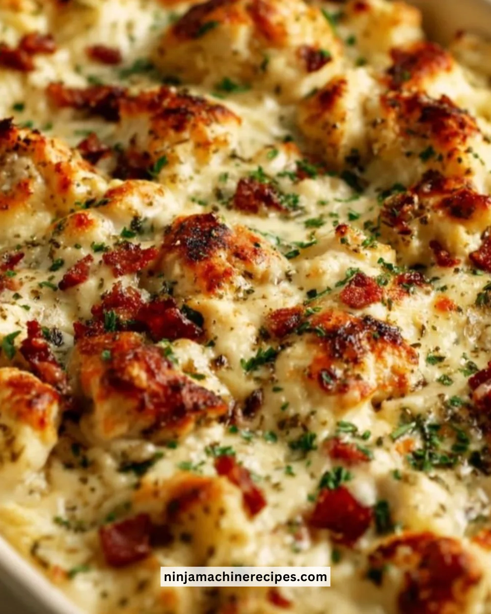 High protein chicken bake dish served on a plate with vegetables