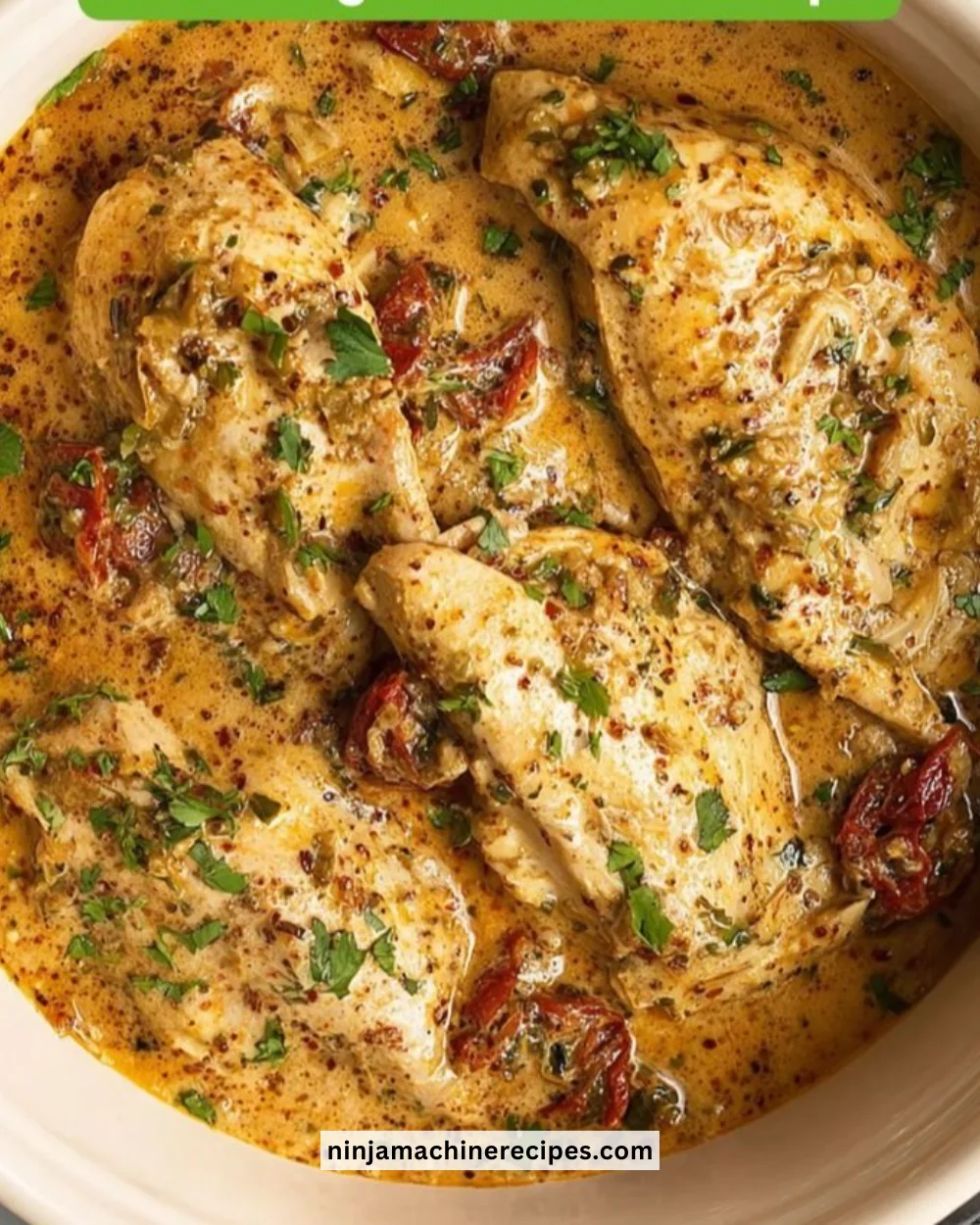High Protein Crockpot Marry Me Chicken served with herbs and a creamy sauce