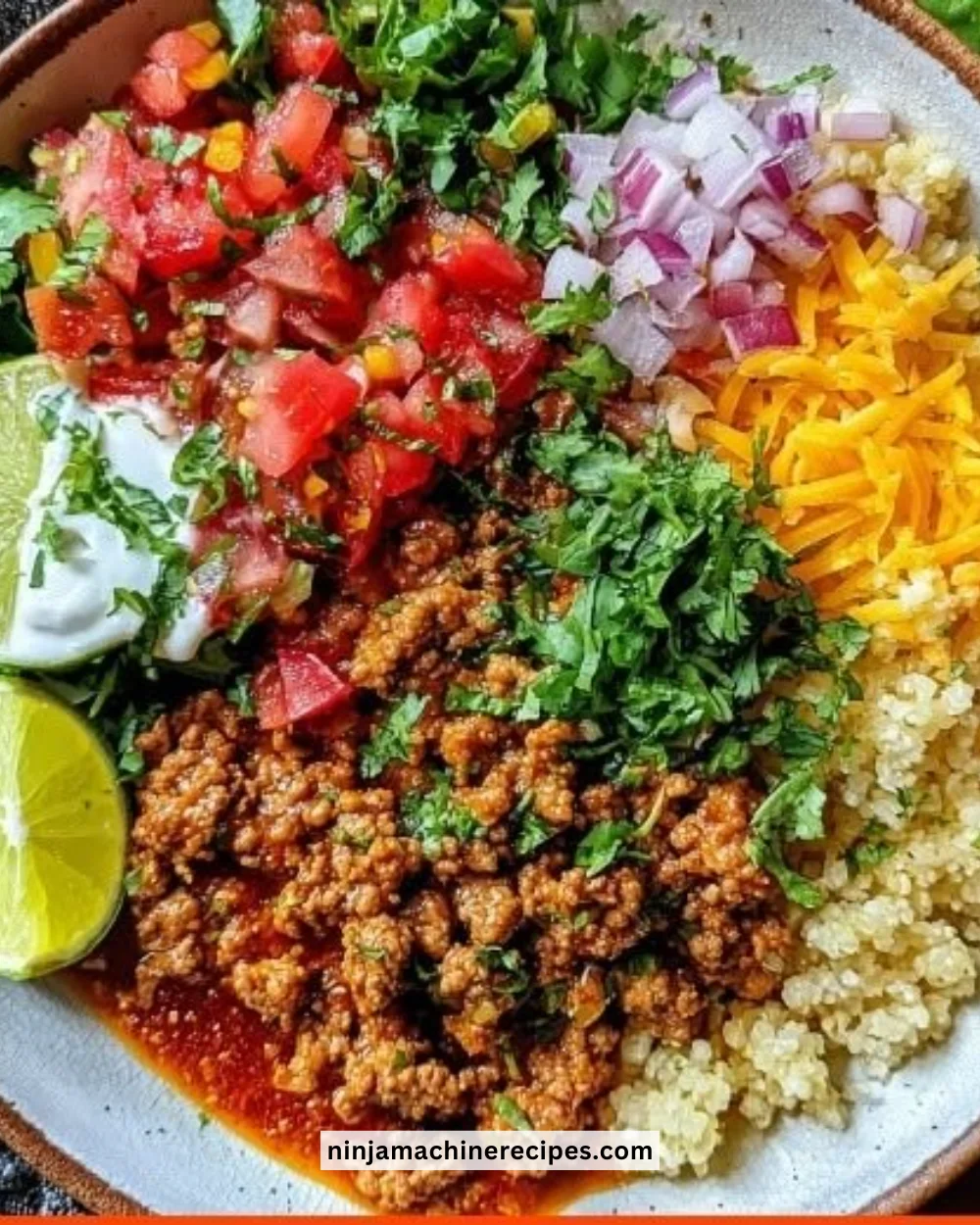 High protein ground turkey taco bowl with fresh ingredients and toppings