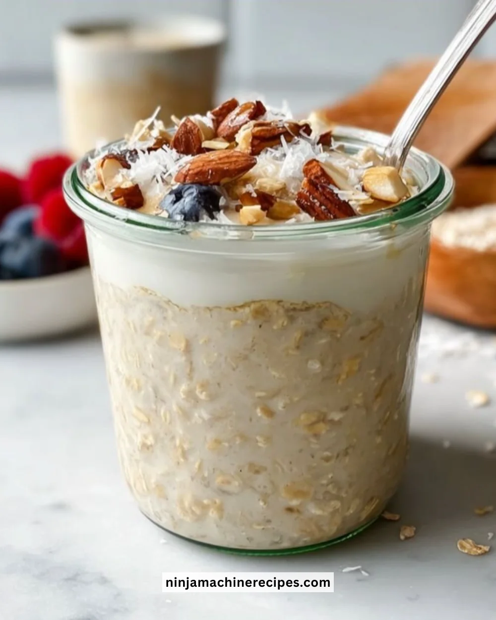 Bowl of high-protein overnight oats with fresh fruits and nuts