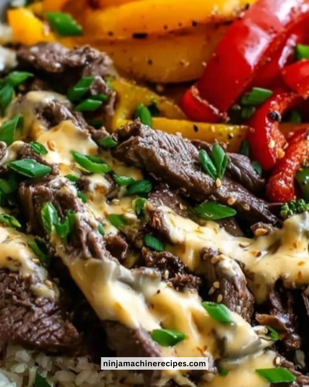 High Protein Philly Cheesesteak Rice Bowl with peppers and onions