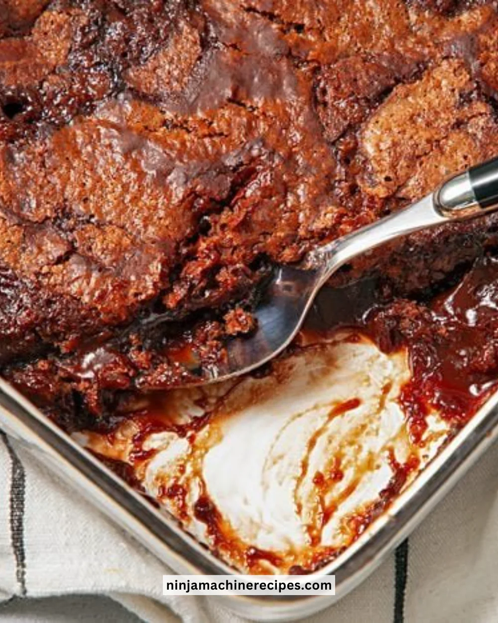 Deliciously moist Hot Fudge Cake topped with rich chocolate fudge sauce