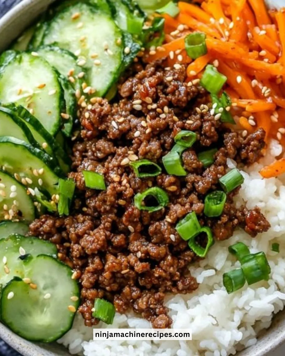 Delicious Korean Ground Beef Bowl topped with fresh vegetables and rice