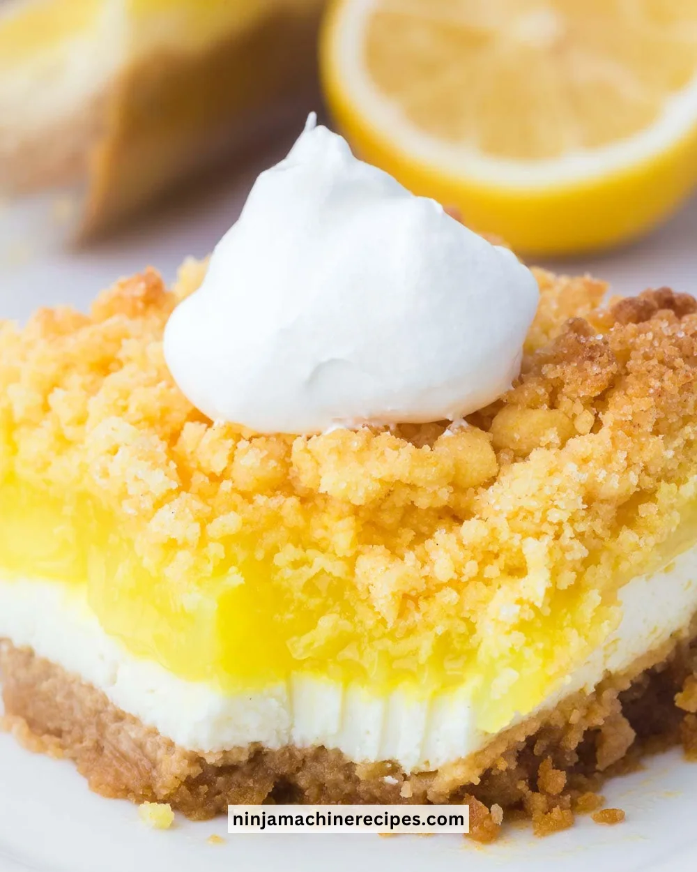 Lemon Cream Cheese Dump Cake with a golden top and lemon slices