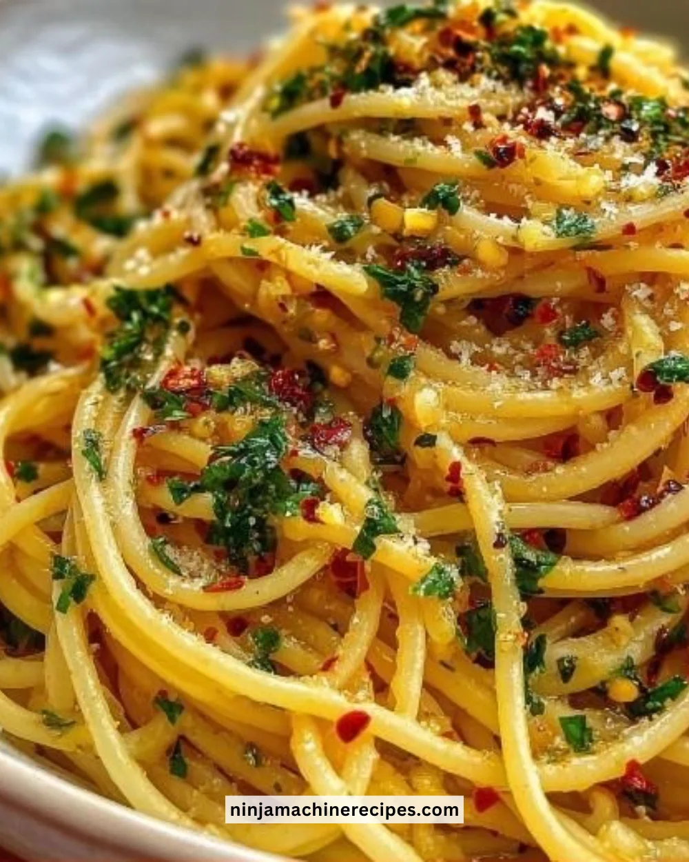 Plate of Midnight Pasta with garlic and chili, showcasing Italian spaghetti dish.