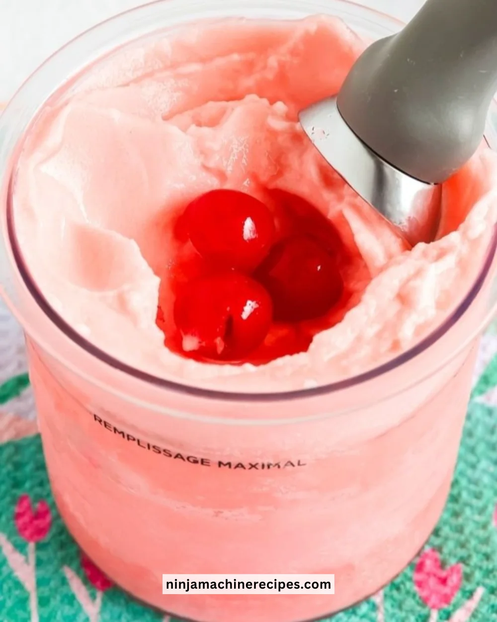 Deliciously creamy Ninja Creami Shirley Temple Ice Cream bowl garnished with cherries.