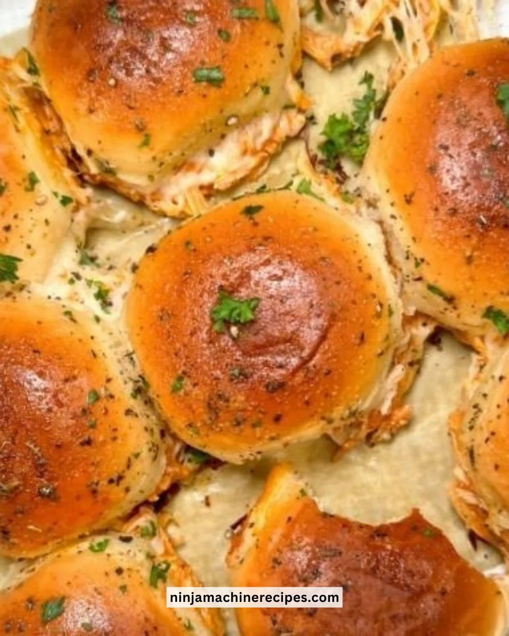 Spicy Buffalo chicken sliders served on a platter