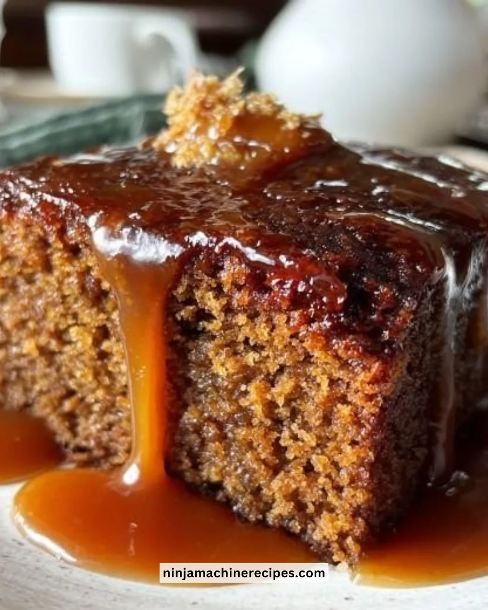 Deliciously moist Sticky Toffee Cake served with caramel sauce