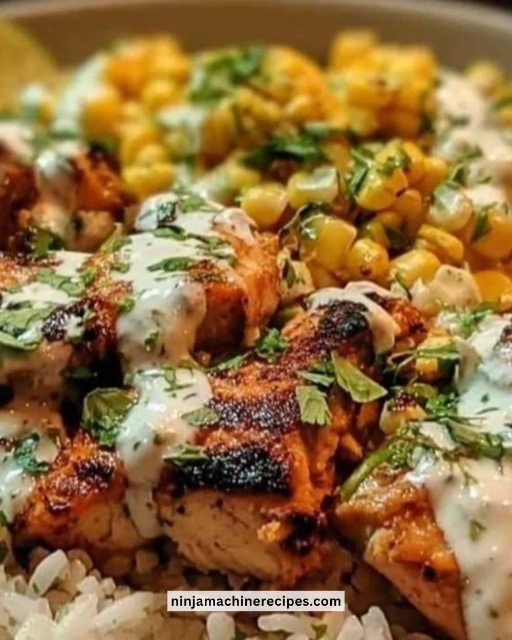 Street Corn Chicken Rice Bowl with tender chicken, rice, and corn topping