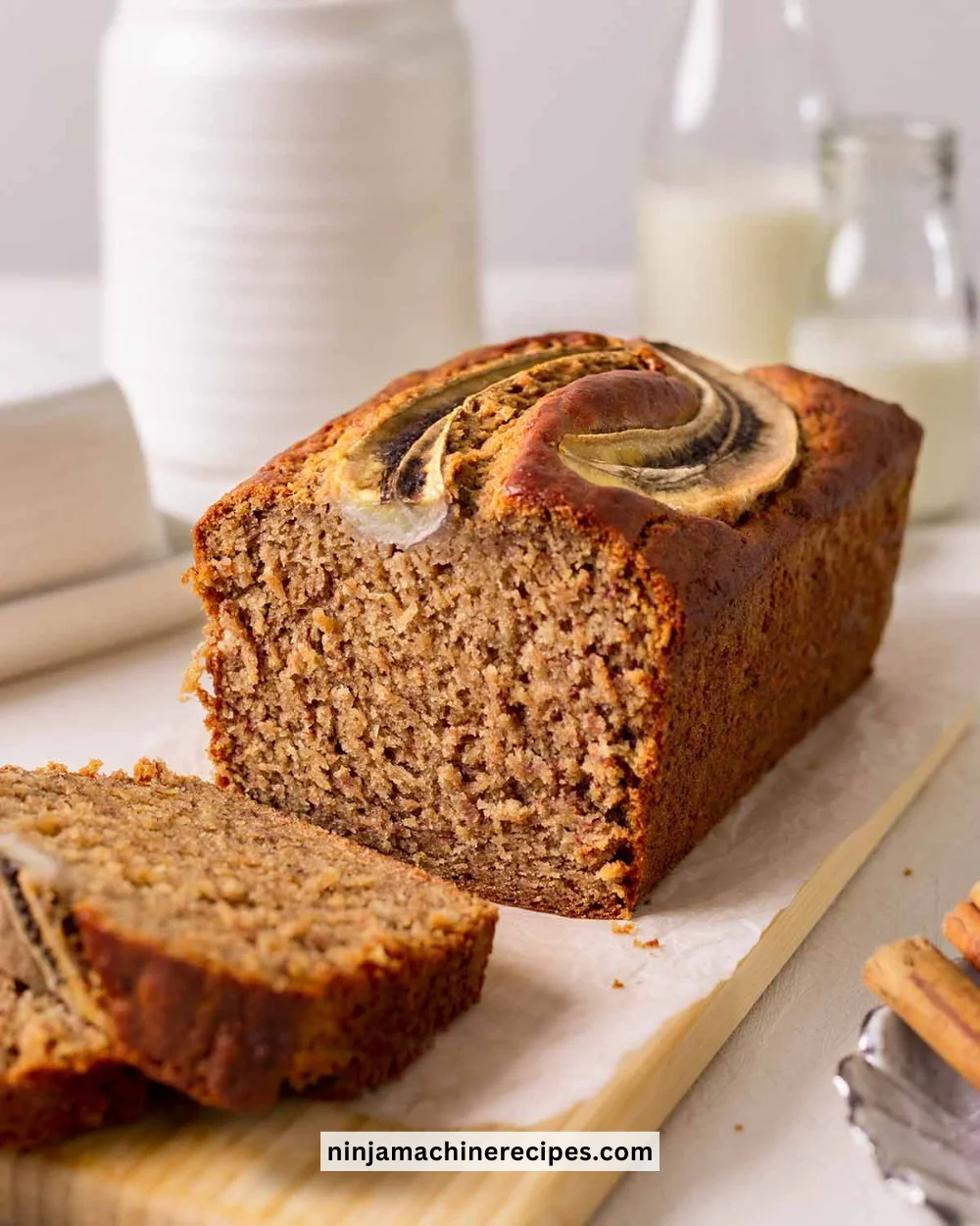 Delicious Vegan Banana Bread loaf with ripe bananas and nuts