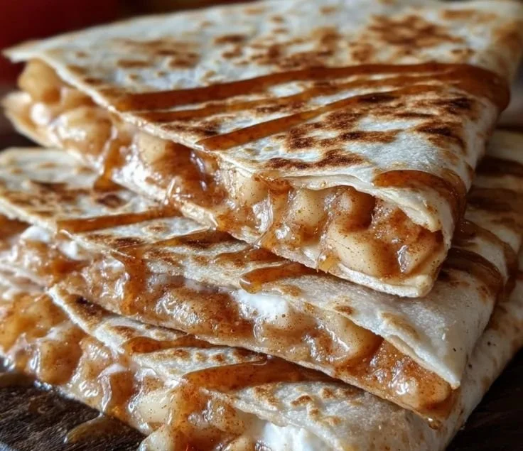 Delicious apple cinnamon breakfast quesadillas served on a plate