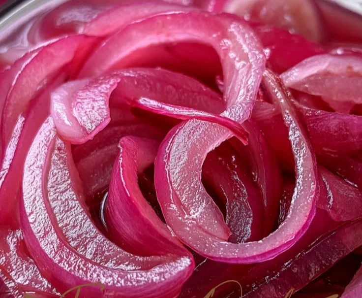 Gordon Ramsay's recipe for flavorful pickled onions served in a jar.