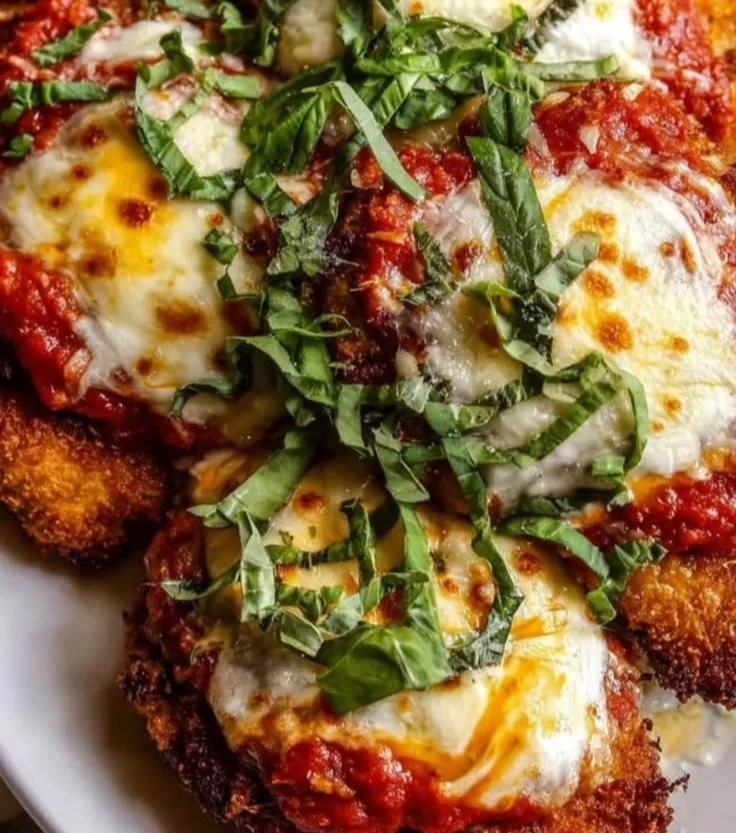 Keto Chicken Parmesan with crispy chicken and marinara sauce