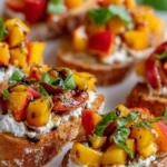 Peach Bruschetta topped with whipped ricotta on toasted bread