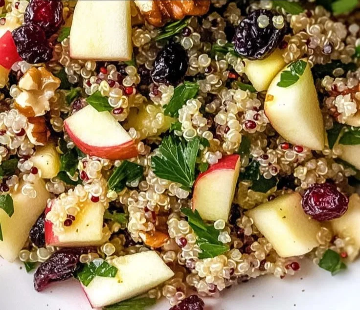 Fresh quinoa apple salad with vibrant ingredients and healthy toppings
