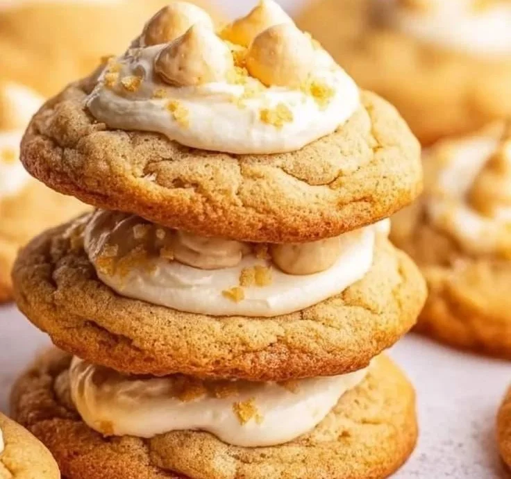 Delicious banana pudding cookies with creamy frosting and banana slices