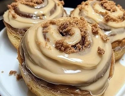 Delicious Biscoff cookie butter cinnamon rolls topped with icing.