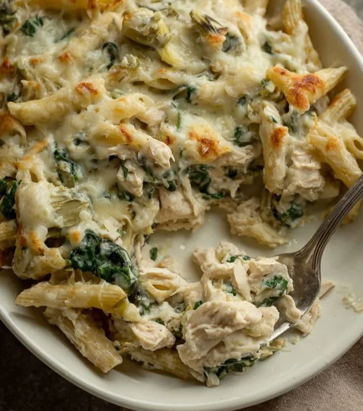 Delicious Chicken Pasta Bake topped with cheese and herbs