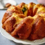 Freshly baked Cinnamon Apple Bundt Cake with a glaze on top