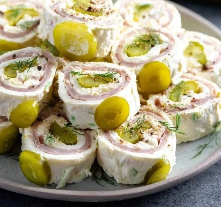 Delicious Dill Pickle Dip Pinwheels served on a platter.