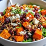 High Protein Sweet Potato Quinoa Salad with fresh ingredients served in a bowl