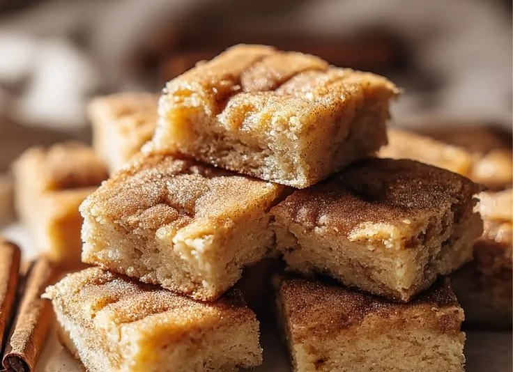 Delicious honey cinnamon dessert served in a bowl with a sprinkle of cinnamon on top.